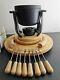 Bodum cast iron fondue set on wooden rotating base Nissen & Digsmed design