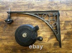Cast in Style iron and wood hand winch, single pulley and bracket. Never used
