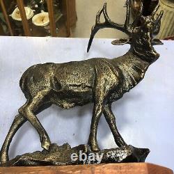 Stag Cast Iron On Wooden Base With Bronze Effect Finish